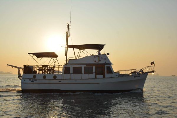 Grand Banks 42 Motor Yacht on Charter in Mumbai at Gateway of India